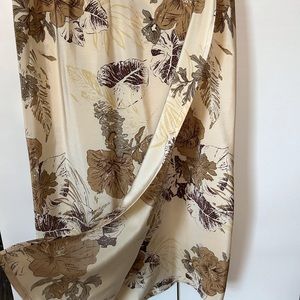 Have silk skirt , L - 30”, CA , made in China.It is Designed Jones & CO.